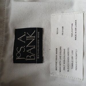 A pair of joa.A.Bank beige khaki pants size 32/31